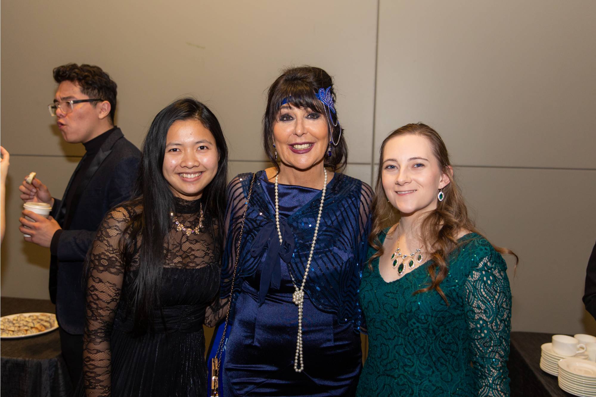 Students posing with Philly at Presidents' Ball